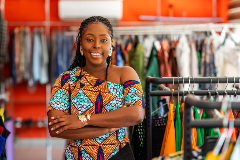 African fashion entrepreneur in boutique