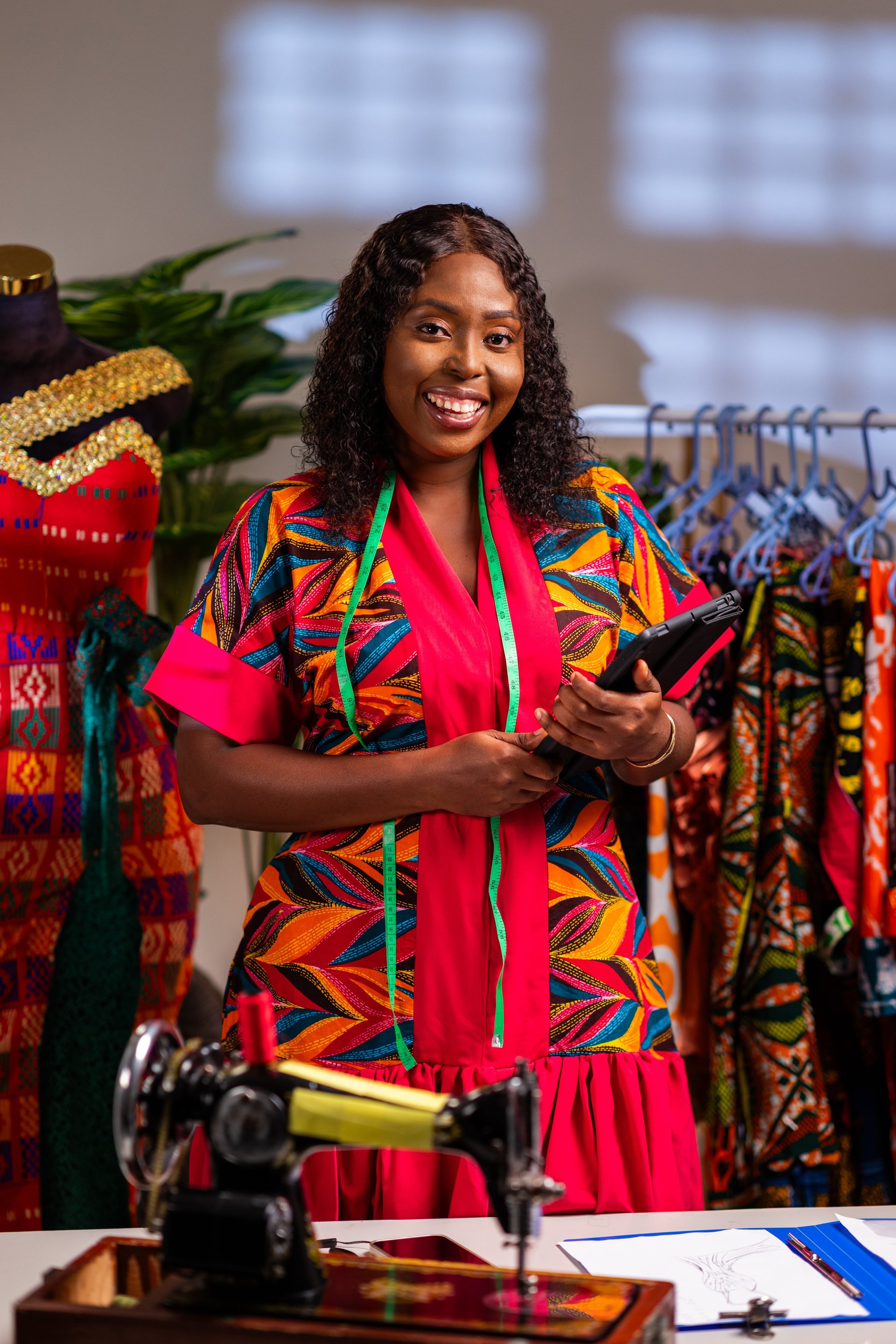 African fashion designer in studio